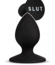 Cuneo anale 6,3 x 3,5 cm. in silicone nero con scritta "SLUT" 