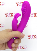 Vibratore rabbit in silicone fucsia con setole stimolanti 18,8 x 3,6 cm.