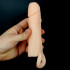 Guaina allunga pene +6 cm. con anello testicoli color carne 15,5 x 3,6 cm. - 1