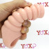 Guaina per pene e testicoli con protuberanze circolari color carne 11 x 5,7 cm. - 5