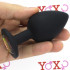 Cuneo anale nero in silicone con gemma arcobaleno tipo diamante 9 x 4,5 cm. - 1
