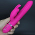 Vibratore Rabbit Fucsia in Silicone con Rilievi Stimolanti 22 x 3,5 cm. - 1